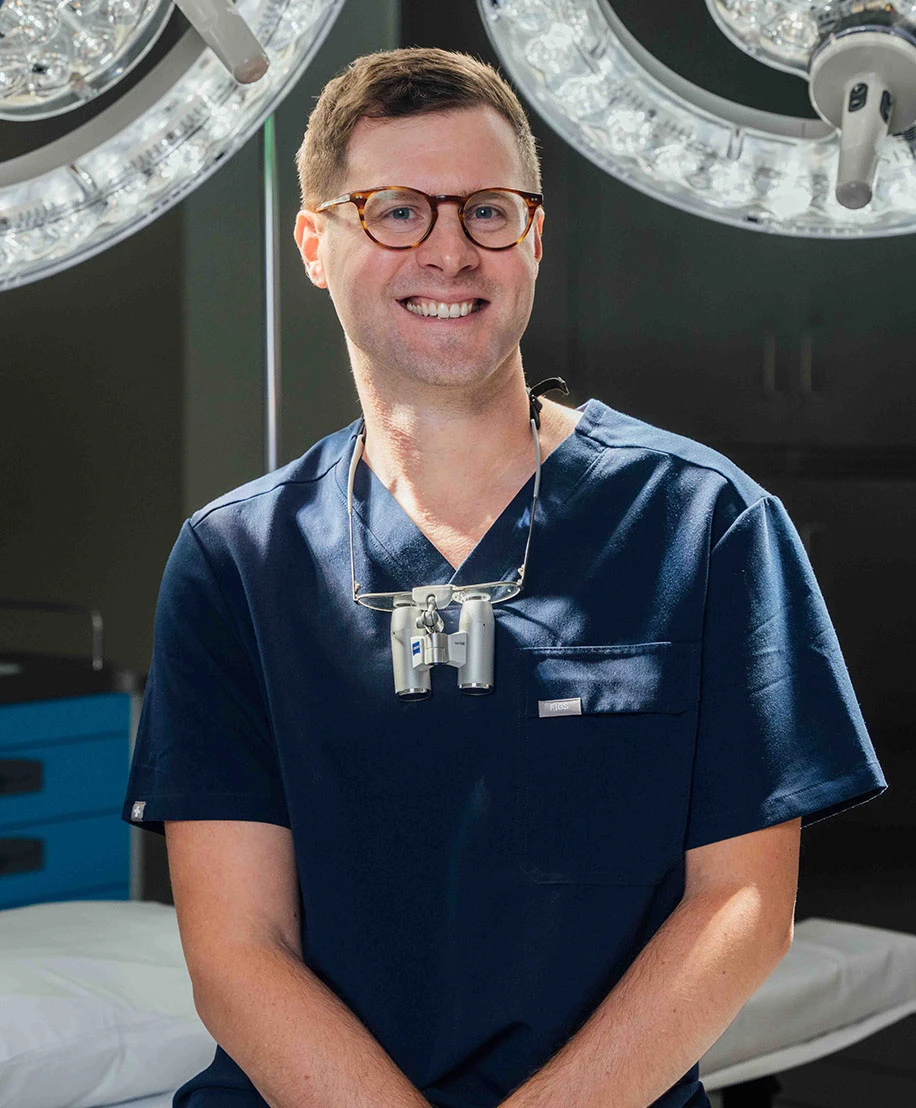 dr. frank smiling in operating room | Ottawa Plastic Surgery in Ottawa, Canada